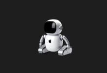 a white robot with a black screen