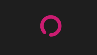 a pink circle on a black background