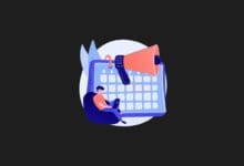 a man sitting in a bean bag with a megaphone and calendar